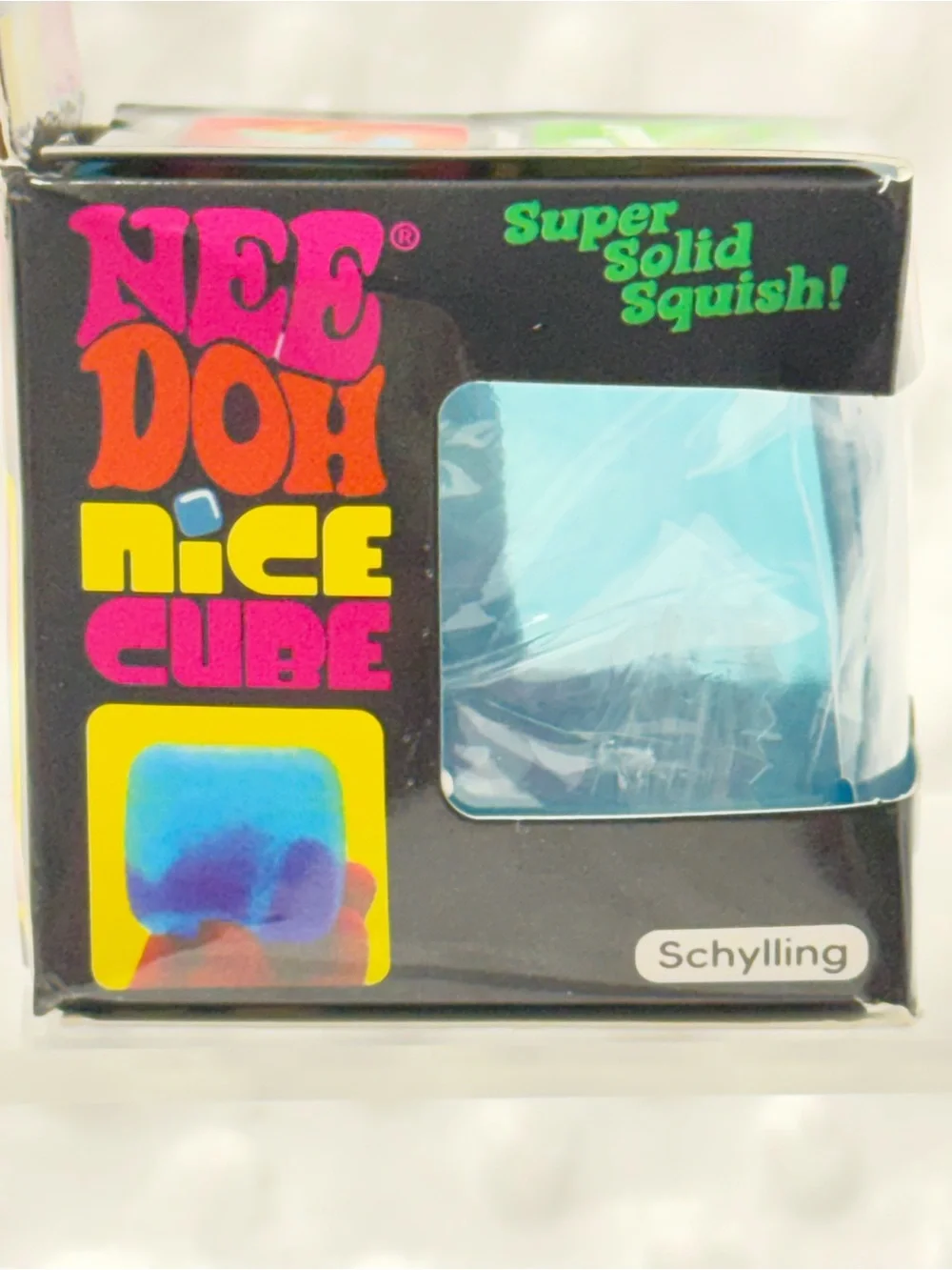 Schylling Needoh Nice Cube - Blue with words backwards